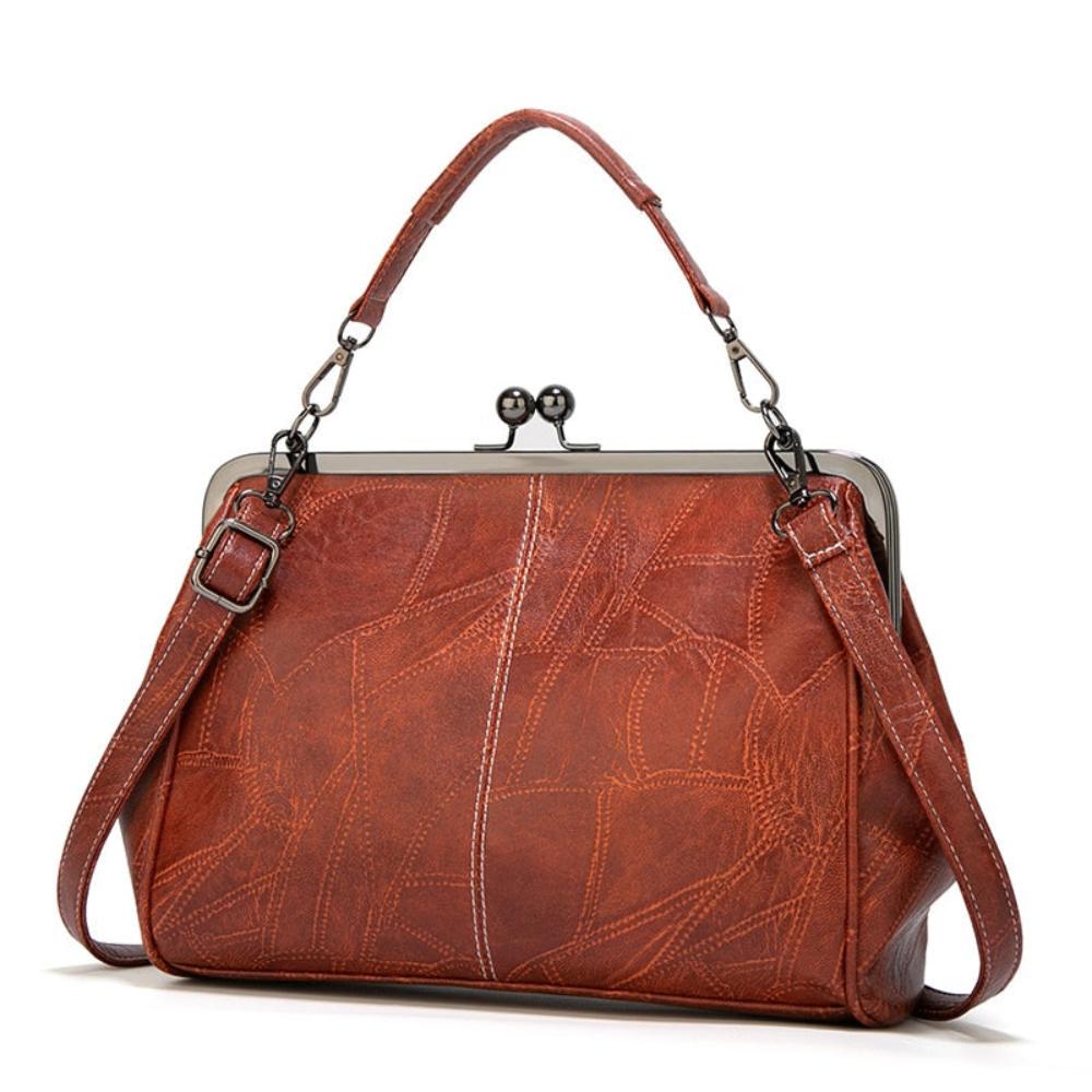 Vintage handtas met kissing sluiting
