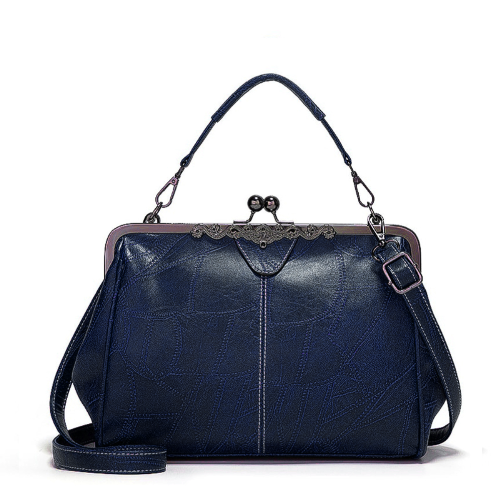 Vintage handtas met kissing sluiting