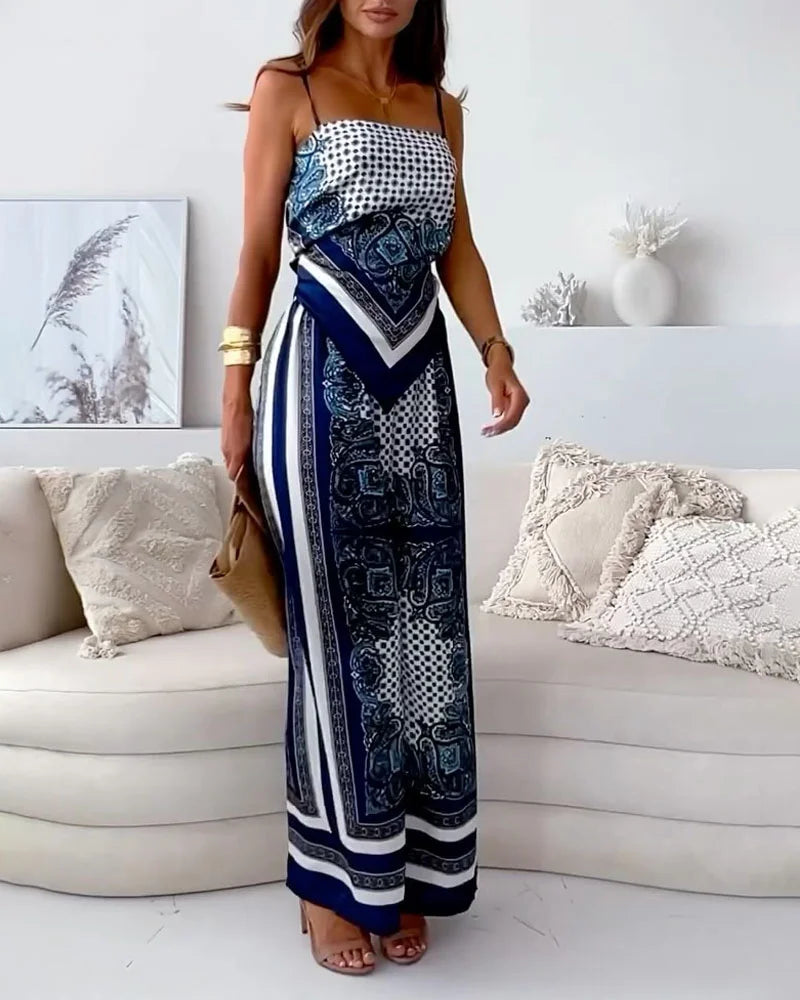 Alya | Elegante twee-delige set met gilet en geprinte broek met strikken