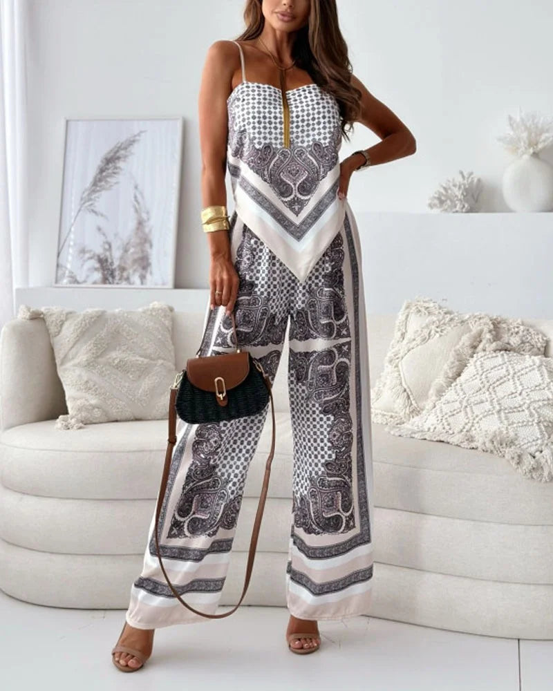 Alya | Elegante twee-delige set met gilet en geprinte broek met strikken