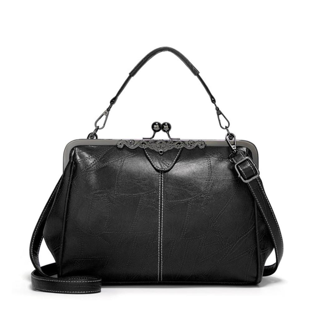 Vintage handtas met kissing sluiting