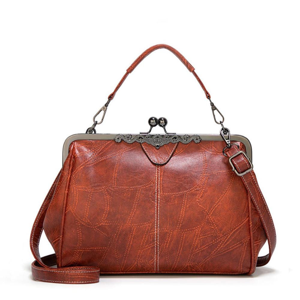 Vintage handtas met kissing sluiting