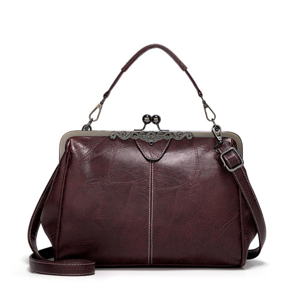 Vintage handtas met kissing sluiting