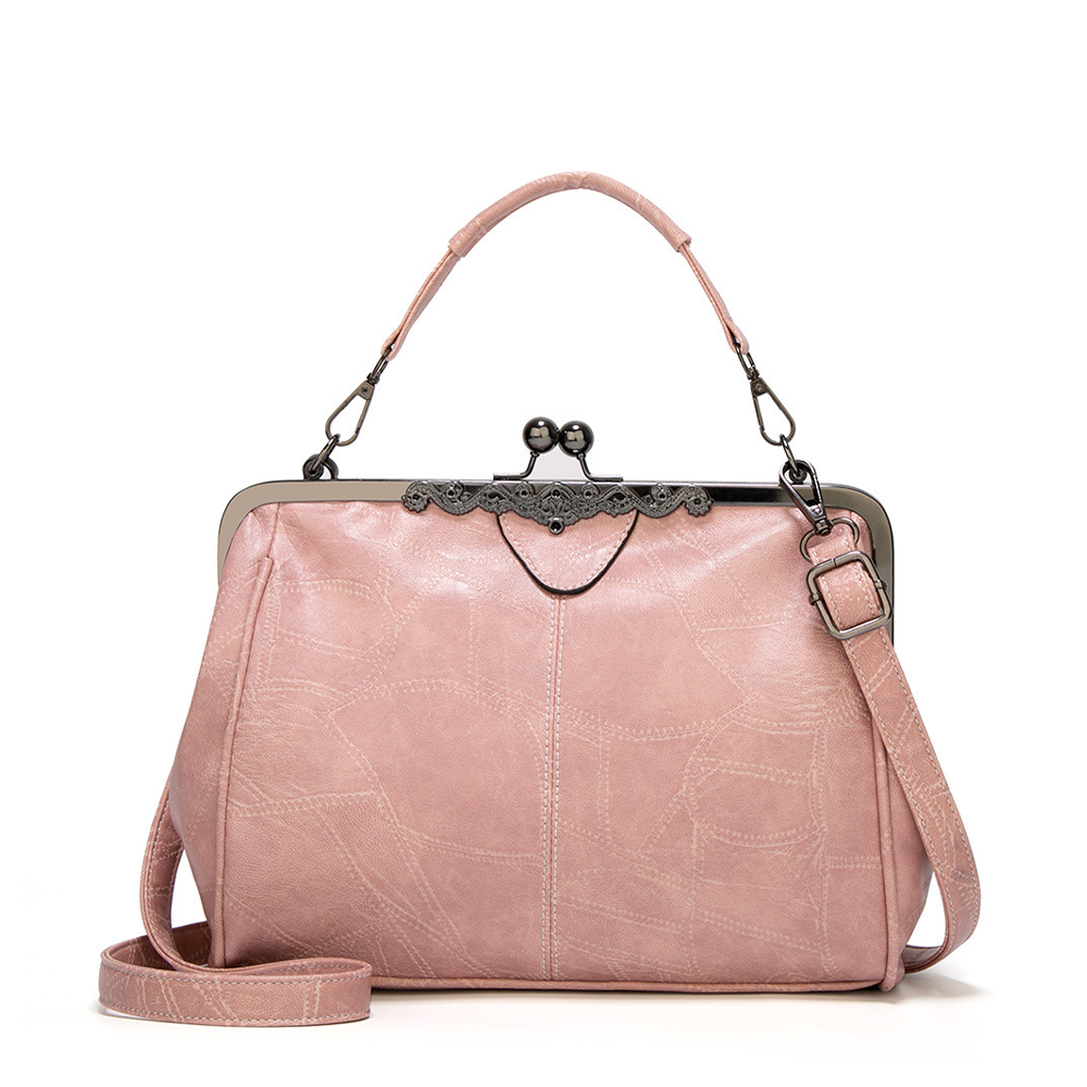 Vintage handtas met kissing sluiting
