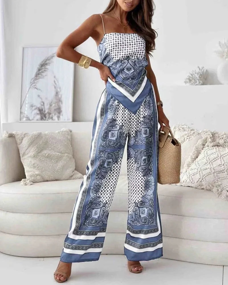 Alya | Elegante twee-delige set met gilet en geprinte broek met strikken
