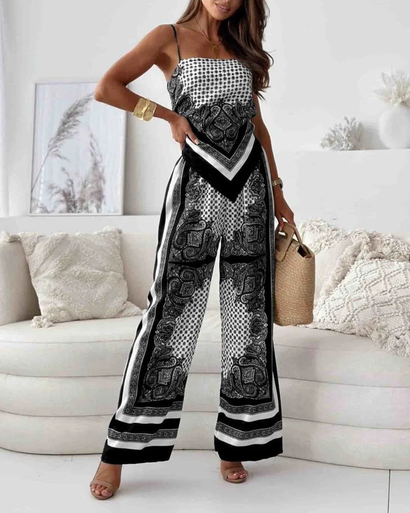 Alya | Elegante twee-delige set met gilet en geprinte broek met strikken